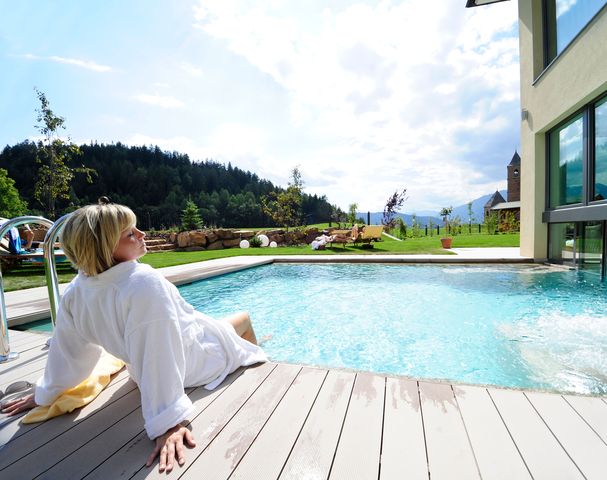 Summer holiday South Tyrol with pool and sunbathing lawn